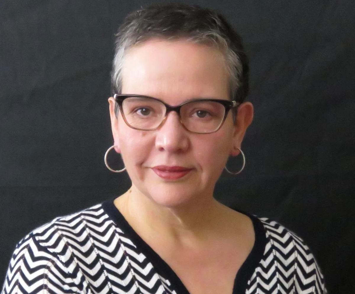 Yannette Figueroa Cole
				